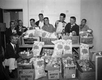 [Canned goods and rice donated to the JACL Christmas Cheer project, Los Angeles, California, December 1957]