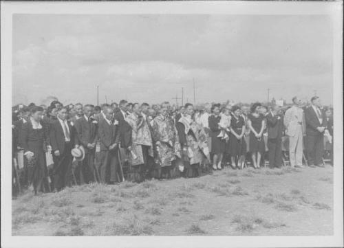 [Three Buddhist priests at front of large crowd, Rohwer, Arkansas, September 30, 1944]