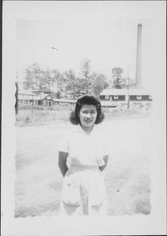[Young woman in candy striper apron, Rohwer, Arkansas]