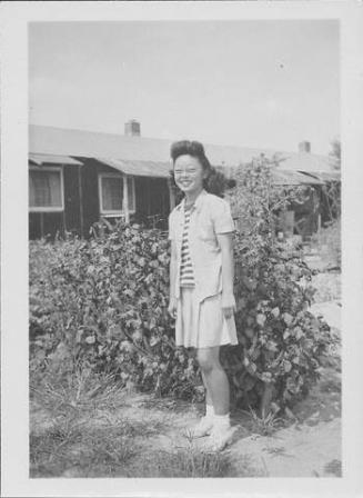 [Girl in eyeglasses and striped shirt, Rohwer, Arkansas]