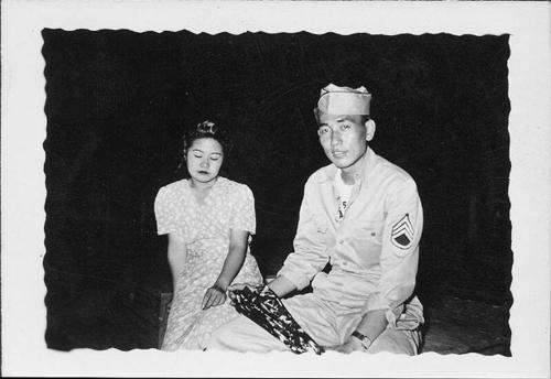 [United States Army staff sergeant and woman in floral dress, Rohwer, Arkansas]