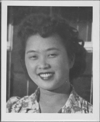 [Young woman in floral blouse, head and shoulder portrait, Rohwer, Arkansas]