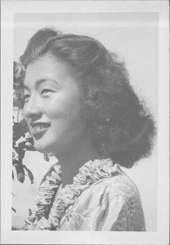 [Young woman in ruffle collared dress, head and shoulder portrait, September 3, 1944]