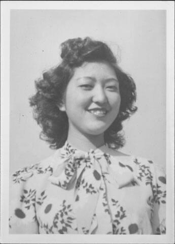 [Young woman in blouse with tied-collar, Rohwer, Arkansas, October 29, 1944]