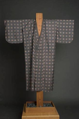 [Dark gray kimono with bullseye pattern]