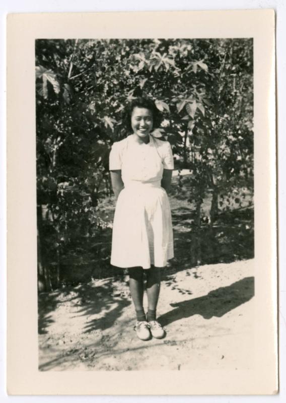 Woman in orchard field