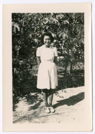 Woman in orchard field