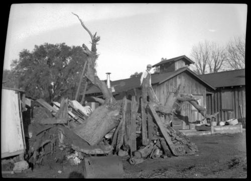 Man standing on scrap wood