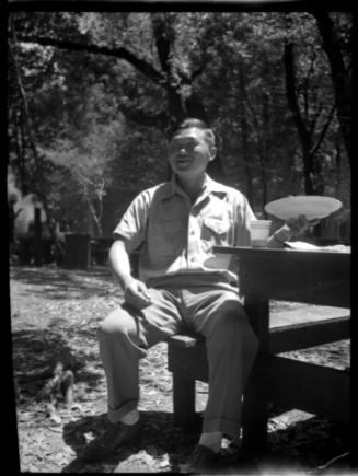Man sitting at a picnic table