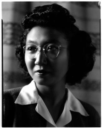 Portrait of Mae Miwa in glasses