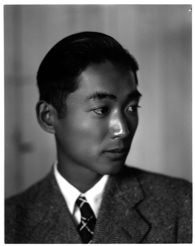 Portrait of Frank Miwa in a suit