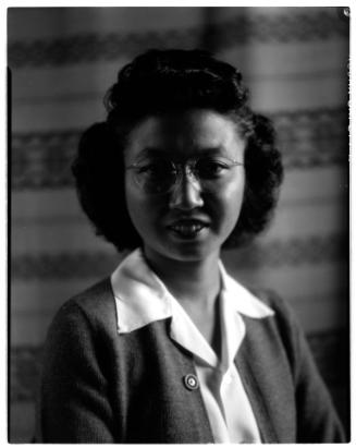 Portrait of Mae Miwa in glasses