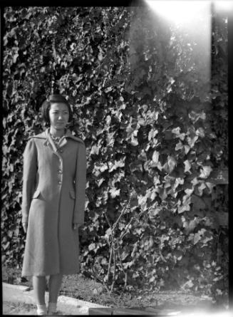 Young woman in coat