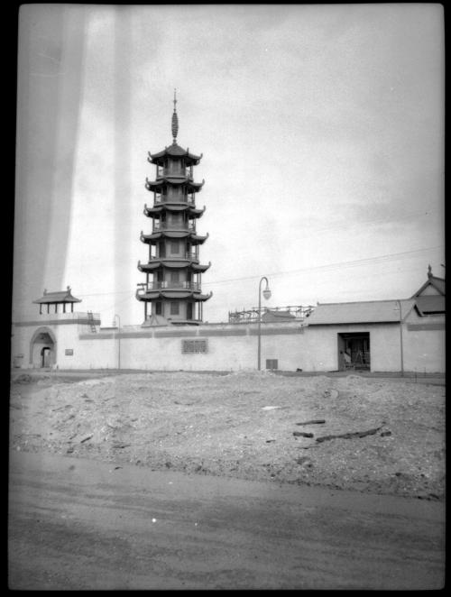 Circular pagoda behind a wall