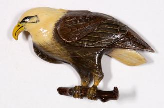 Carved eagle pin