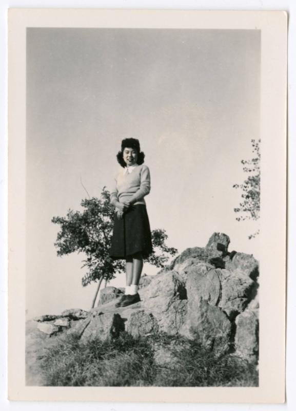 Woman on rock formation