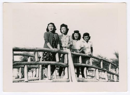 Four women on footbridge