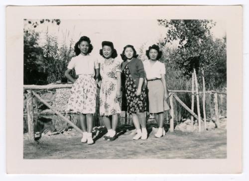 Four women by pond