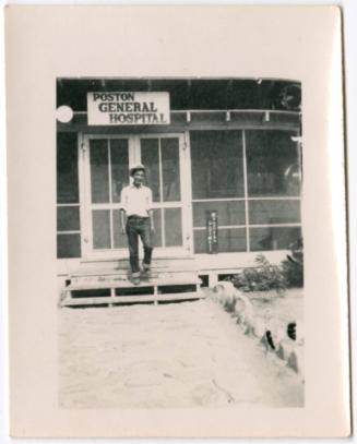 Man standing outside Poston General Hospital