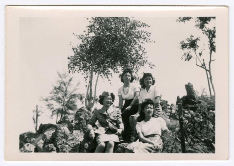 Four women on rock formation