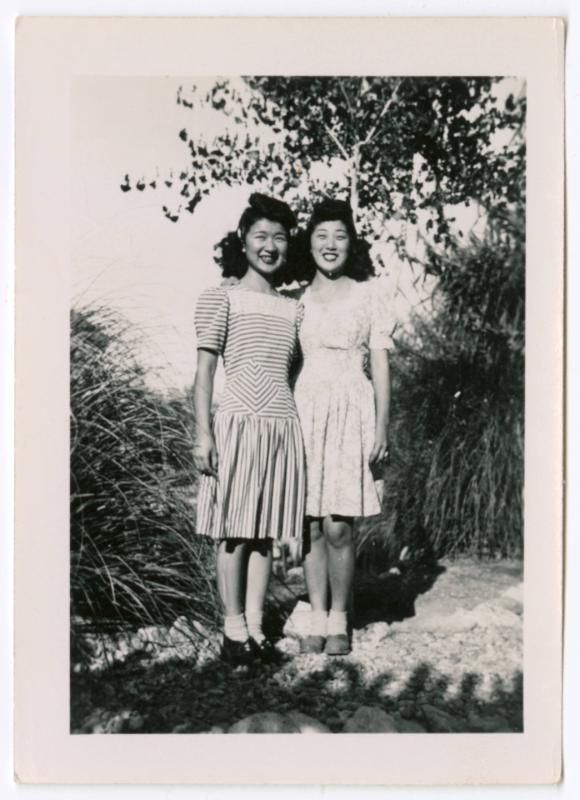 Two young women in dresses