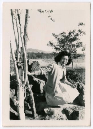 Woman on rock formation