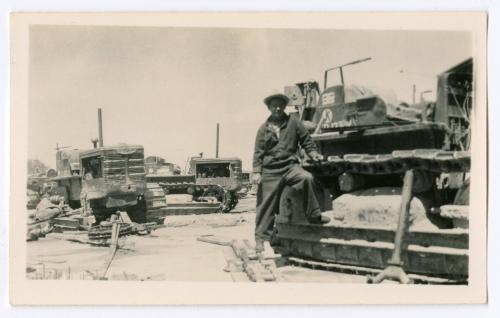 Man with farm equipment