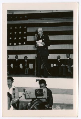 Man in uniform giving speech