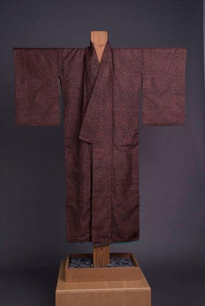 [Brown and black kimono with turquoise lining]