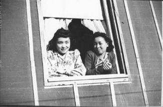 [Two women at barrack window, Heart Mountain, between 1943 and 1945]