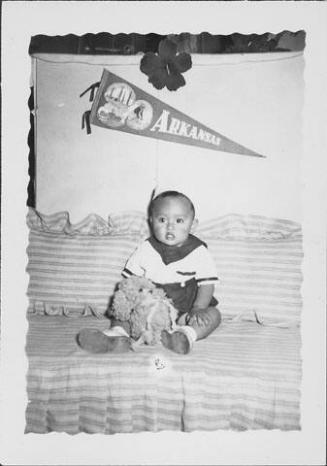 [Toddler in sailor outfit, Rohwer Arkansas, May 24, 1944]