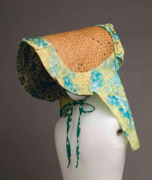 [Slat sunbonnet with green, blue, and yellow trim, Puunene, Maui]