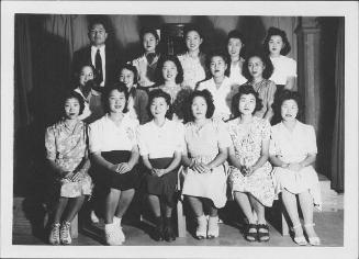 [Group portrait of fifteen women and one man, Rohwer, Arkansas, 1942-1945]