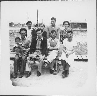 [Group portrait with boy in overalls, Rohwer, Arkansas]