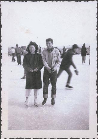 [Boy and girl in ice skates, Heart Mountain, Wyoming, 1943]