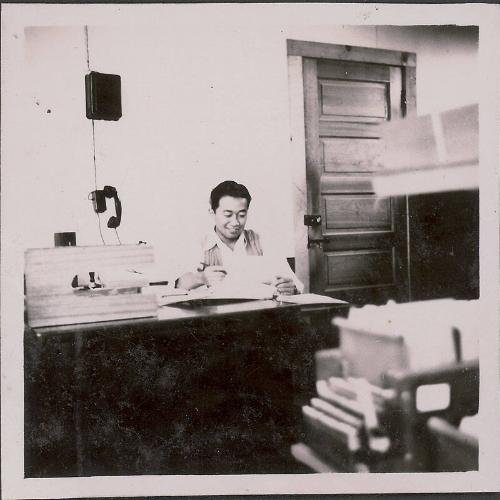 [Man working at desk, Heart Mountain, Wyoming, 1943]