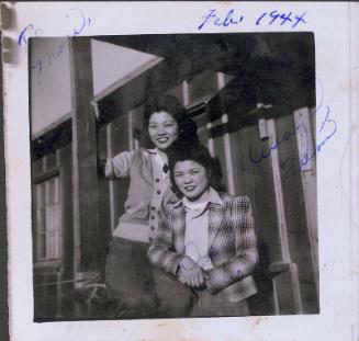 [Two young women in front of barracks, Heart Mountain, Wyoming, February 1944]