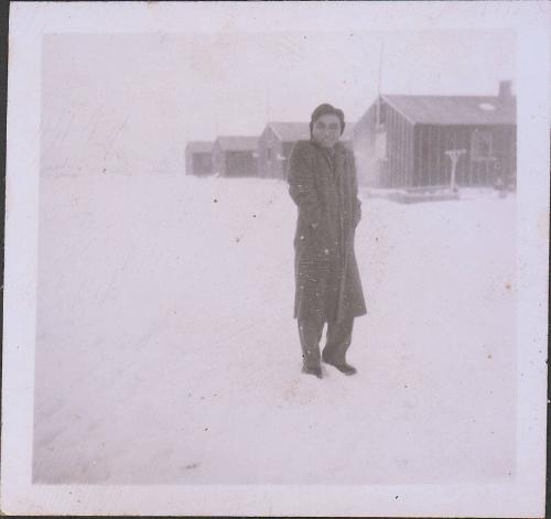[Man in overcoat standing in snow, Heart Mountain, Wyoming, Winter 1944-1945]