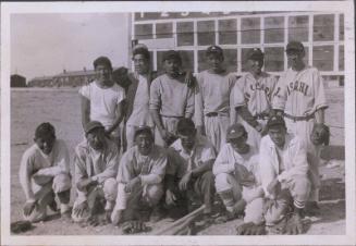 [Baseball team in front of scoreboard, Heart Mountain, Wyoming, 1944]