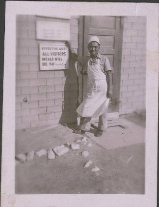 [Portrait of man in front of mess hall, Heart Mountain, Wyoming, 1944]