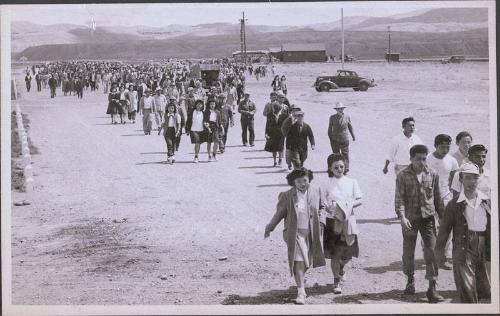 [Heart Mountain evacuees heading back to camp after sending off friends, Heart Mountain, Wyoming, May 1945]