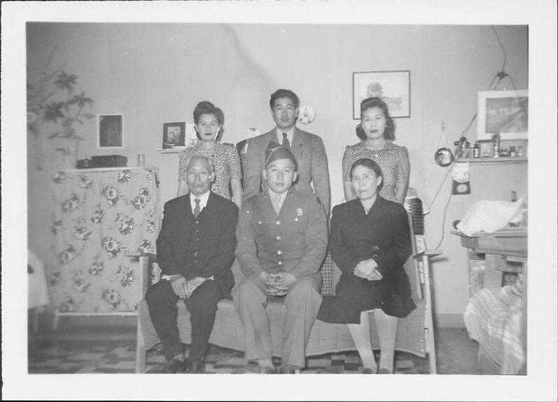 [United States Army soldier with family in barracks, Rohwer, Arkansas, 1942-1945]