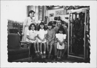 [Niiya family in room, Rohwer, Arkansas, 1942-1945]