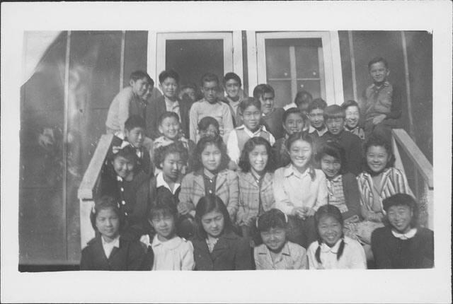 [Children on barracks steps, Rohwer, Arkansas]