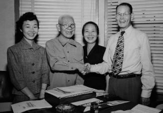 [Takagi family in office of Katsuma Mukaeda, California, July 17, 1951]