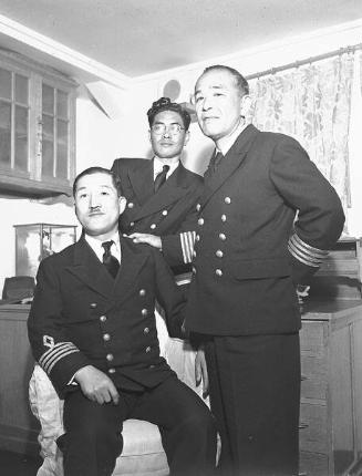 [Three crew members of Japanese ship in San Pedro Harbor, San Pedro, California, 1951]