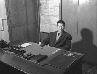 [Jimmie Ito at desk, California, 1951]