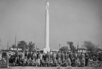 [Veterans of Foreign Wars at World War II monument at Evergreen Cemetery, Los Angeles, California, February 22, 1953]