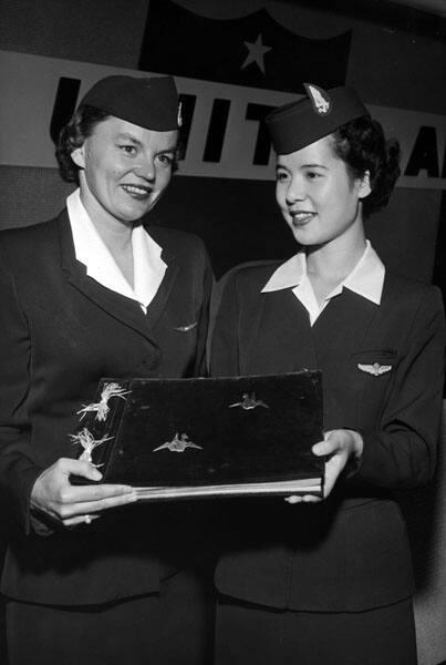 [Two Japanese Airline stewardesses, Califonria, April 21, 1954]