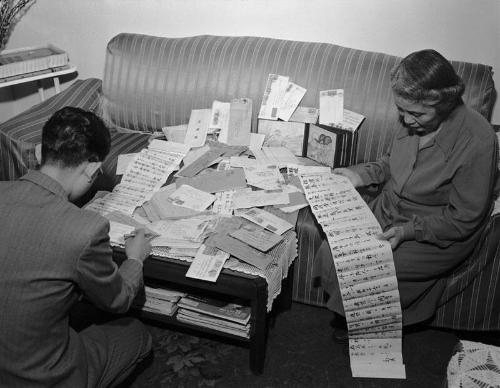 [Mrs. Furuzawa reading letters at home, March 22, 1950]